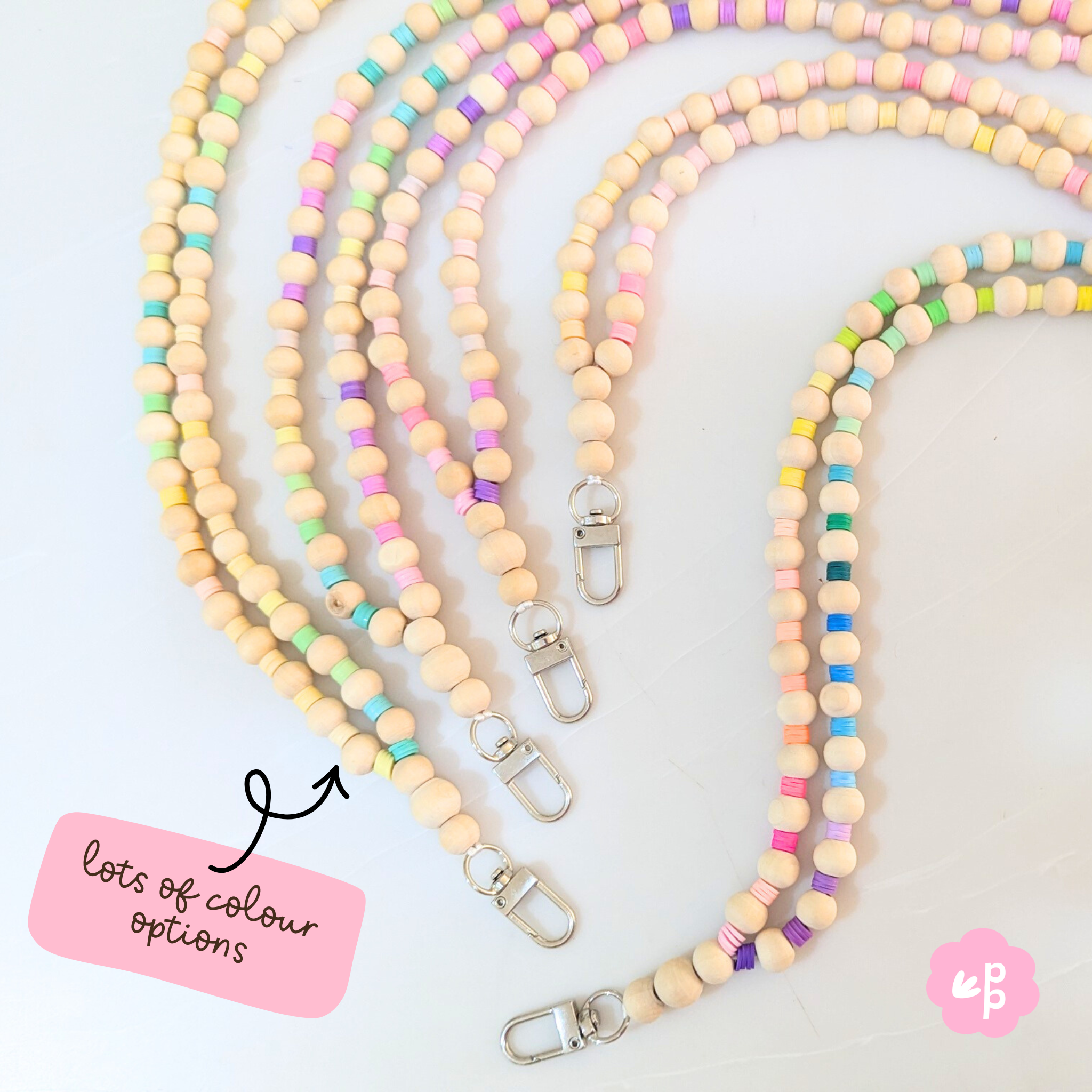 Pastel wooden beaded teacher lanyards with silver clasp and natural wood accents from Priority Play