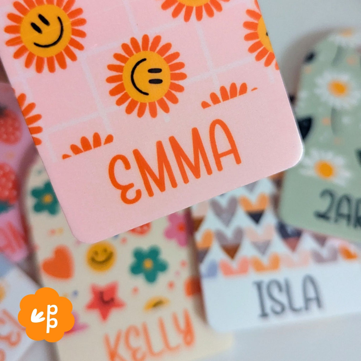 Close up of personalised bag tag showing vibrant sublimation print and smooth finish, durable custom kids name tag by Priority Play