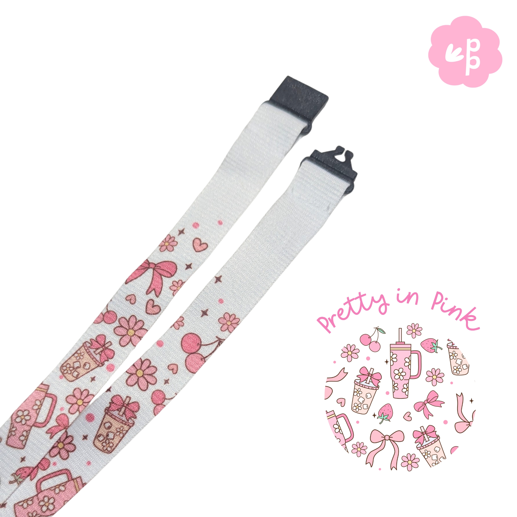 teacher lanyard with pink patterns on a white background, featuring the brand logo in the corner and breakaway clasp.