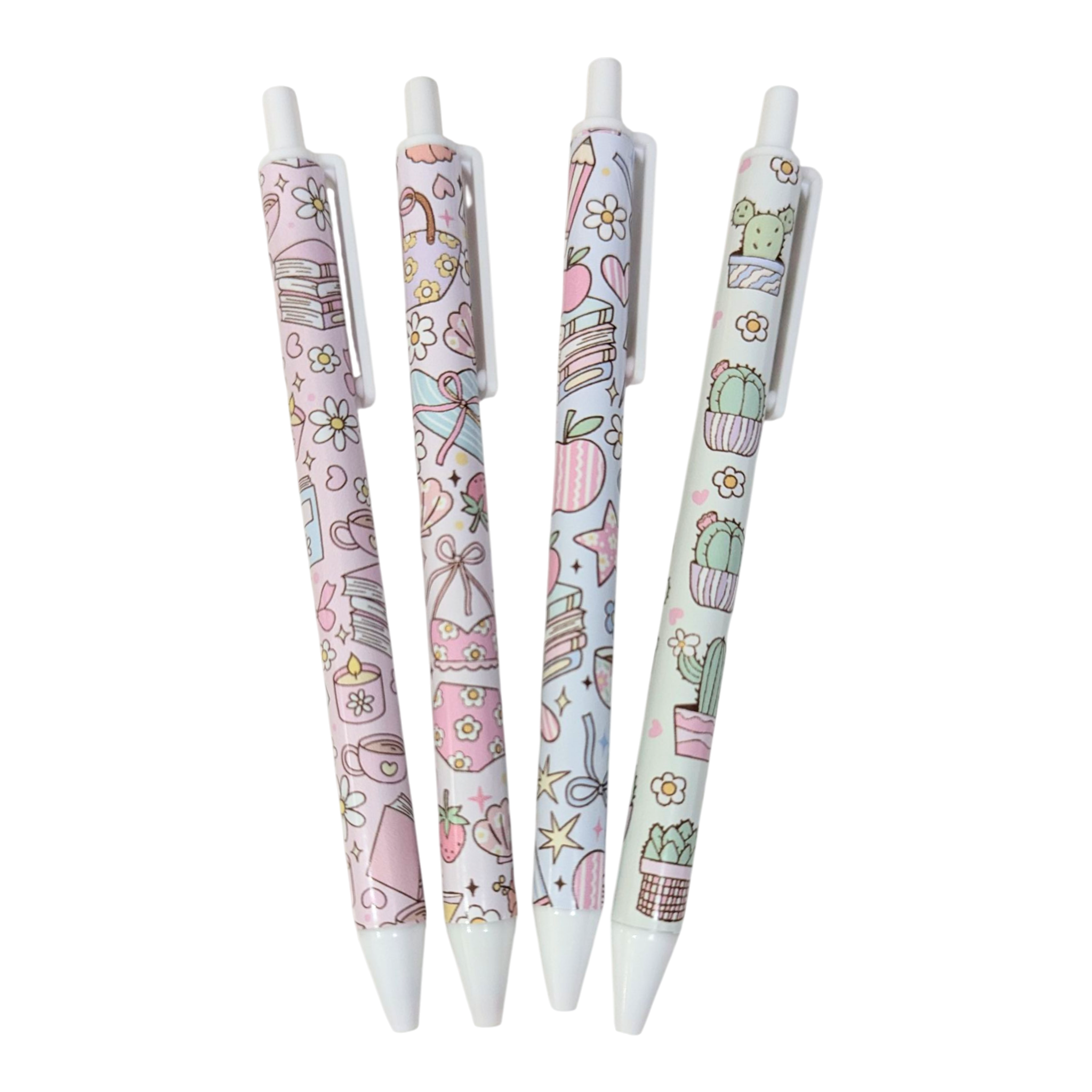 Pastel vinyl wrapped pen set featuring book, cactus, and floral designs, handmade kawaii stationery from Priority Play.