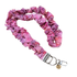 Pink scrunchie lanyard with a metal clip on a white background for teachers