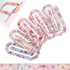 Cute pink patterned oversized acrylic paper clips with hearts, strawberries, and daisies – decorative stationery accessories.