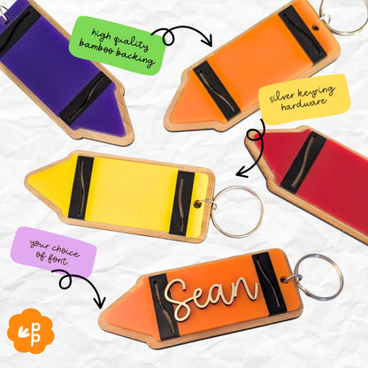Back view of personalised pencil keyring showing high quality bamboo backing and silver keyring hardware with colourful acrylic optio
