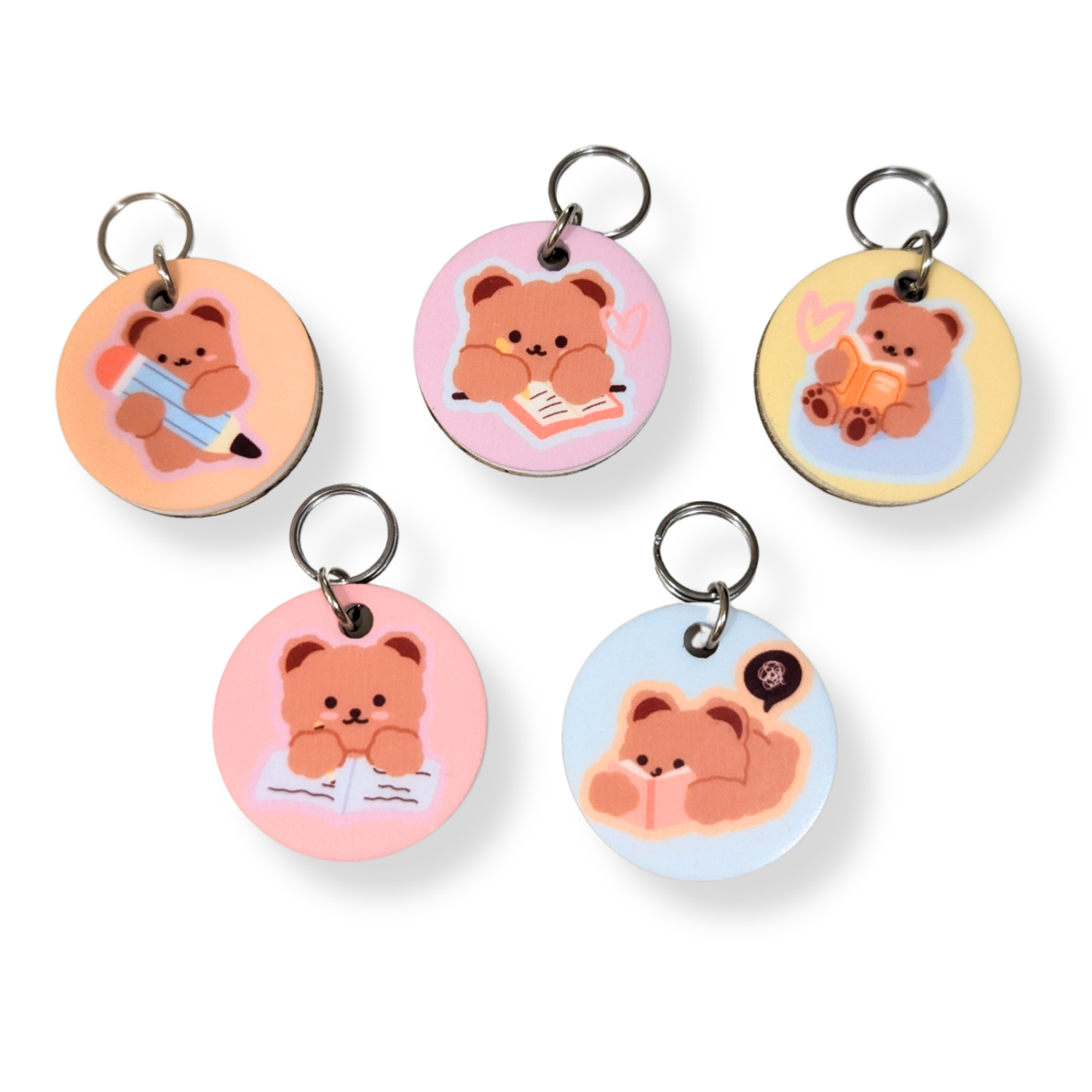 Five Beary Cute wooden lanyard charms featuring bears with pencils and books — handmade teacher lanyard accessories with pastel designs.