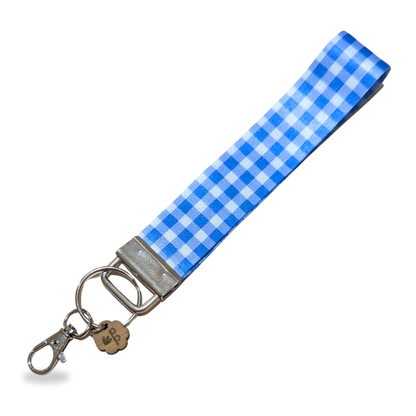 Handmade blue gingham fabric wristlet keychain, perfect for holding keys or gifting to teachers.