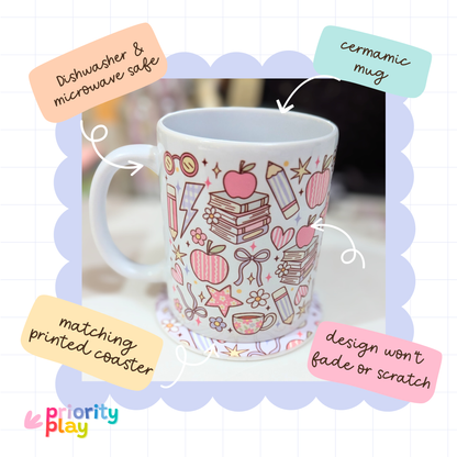 Flatlay of pink books and coffee themed ceramic mug with matching printed coaster by Priority Play.