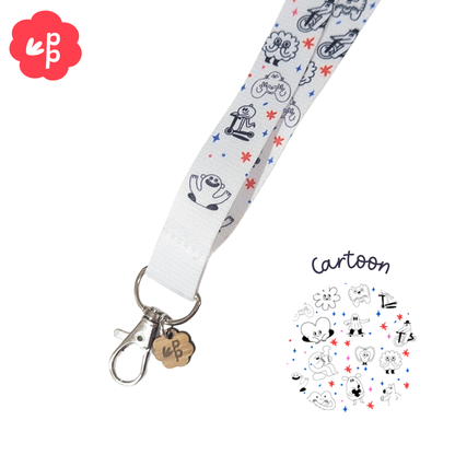 Cartoon-themed lanyard with keychain on a white background and silver clasp