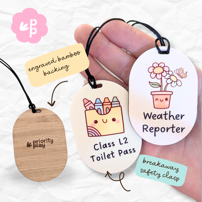 Classroom passes including Weather Reporter and Toilet Pass tags featuring engraved bamboo backing and breakaway safety clasp by Priority Play