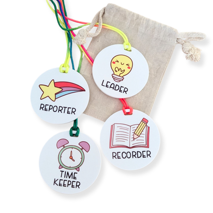 Set of four classroom role tags for students – Leader, Reporter, Timekeeper, and Recorder – with bright illustrations and drawstring bag by Priority Play