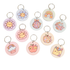 Cute round bamboo keyrings with pastel designs including flowers, rainbows, apples, and disco balls — perfect teacher or student gifts from Priority Play.