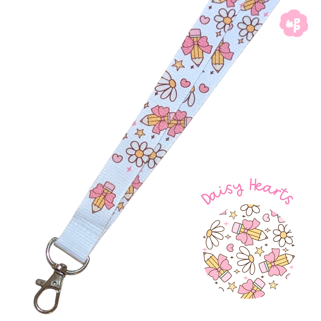 White fabric teacher lanyard with a daisy and heart pattern and silver clasp.