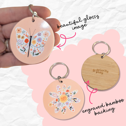 Floral butterfly keyring with engraved bamboo backing – a beautiful glossy design by Priority Play.