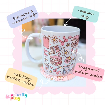 Flatlay of pink books and coffee themed ceramic mug with matching printed coaster by Priority Play.