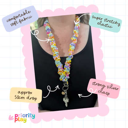 Handmade colorful fabric lanyard for teachers featuring soft stretchy material, strong silver clasp, and comfortable 50cm drop, perfect for holding keys or ID badges