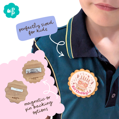 Child wearing It’s My Birthday bamboo badge, available with magnetic or pin backing by Priority Play.