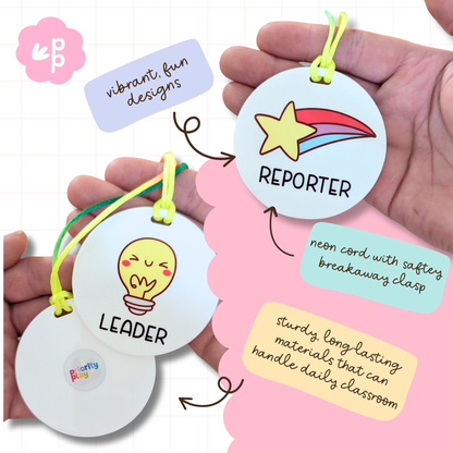 Close-up of Leader and Reporter classroom role tags with neon cords, safety breakaway clasp, and durable design for daily classroom use by Priority Play.