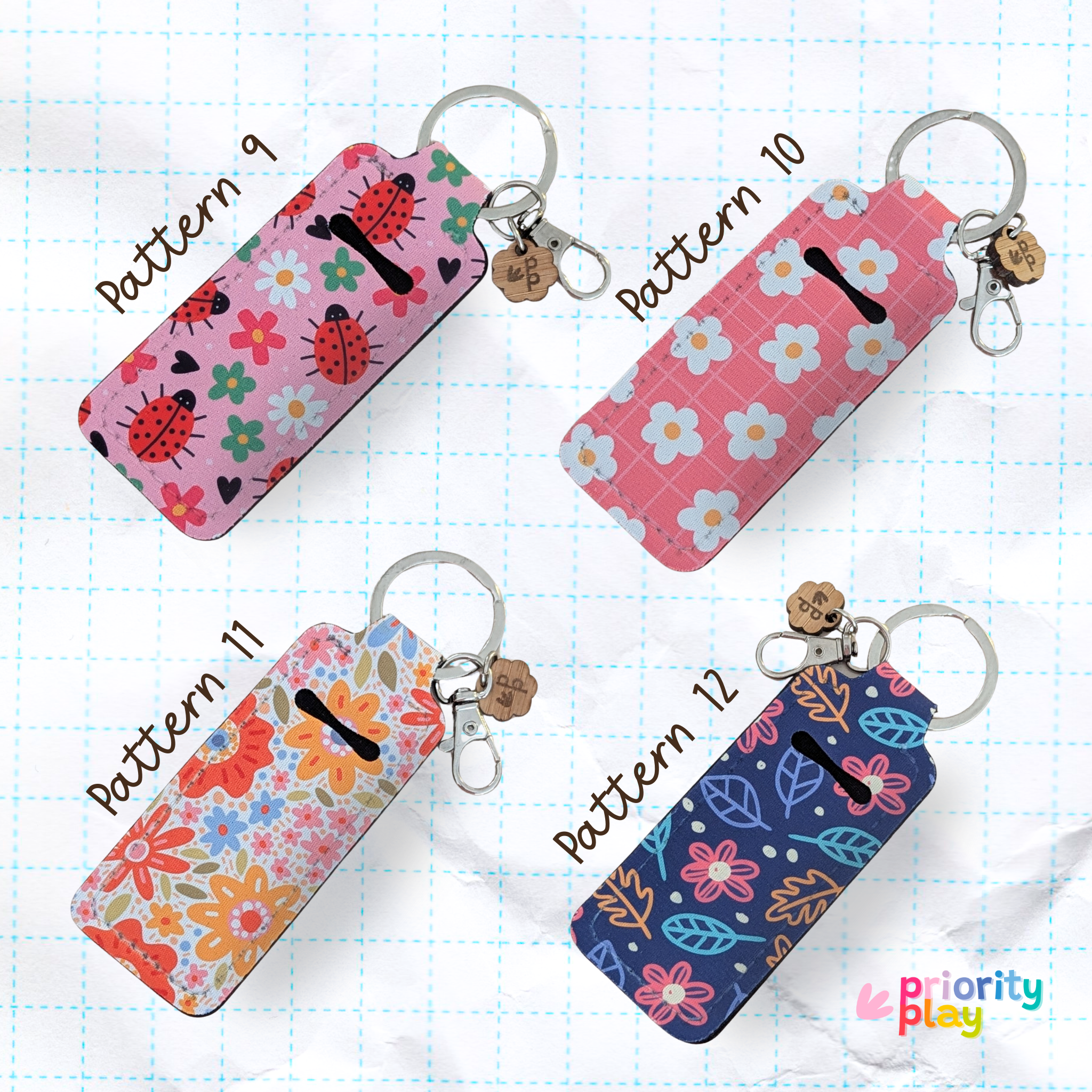 Set of four floral and ladybug lip balm holder keychains with colorful designs, ideal for teachers, mums or friends — handmade by Priority Play.