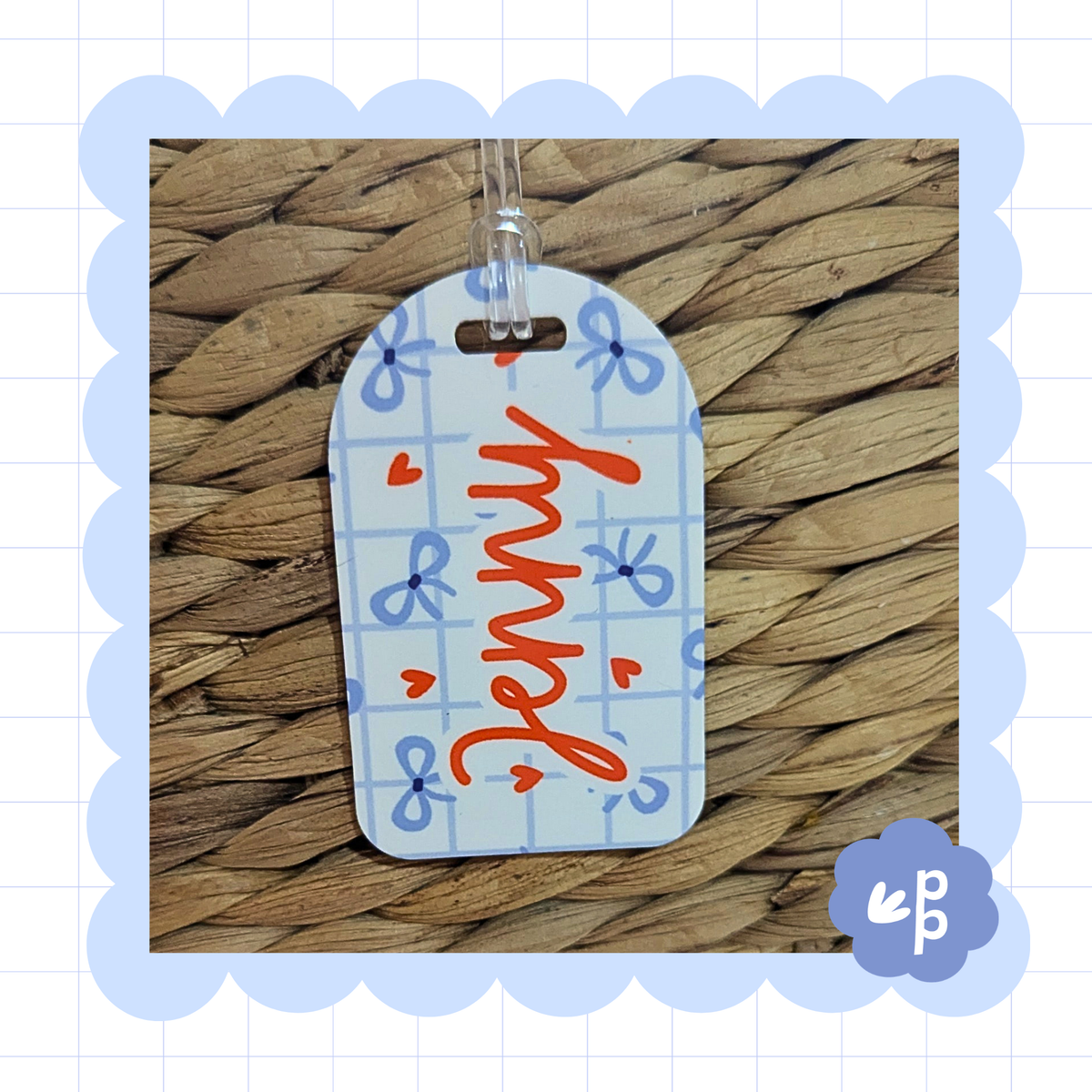 Close up personalised kids bag tag with name Jenny and cute bow pattern attached with clear loop by Priority Play