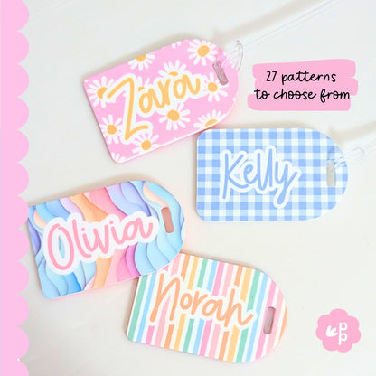 Personalized luggage tags with names and colorful patterns on a light background