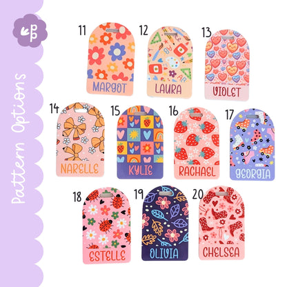 Personalised kids bag tag pattern options including bows, hearts, roller skates and floral designs, custom name luggage tags by Priority Play