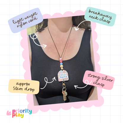 educator wearing a personalised teacher lanyard showing 50cm length and silver clasp