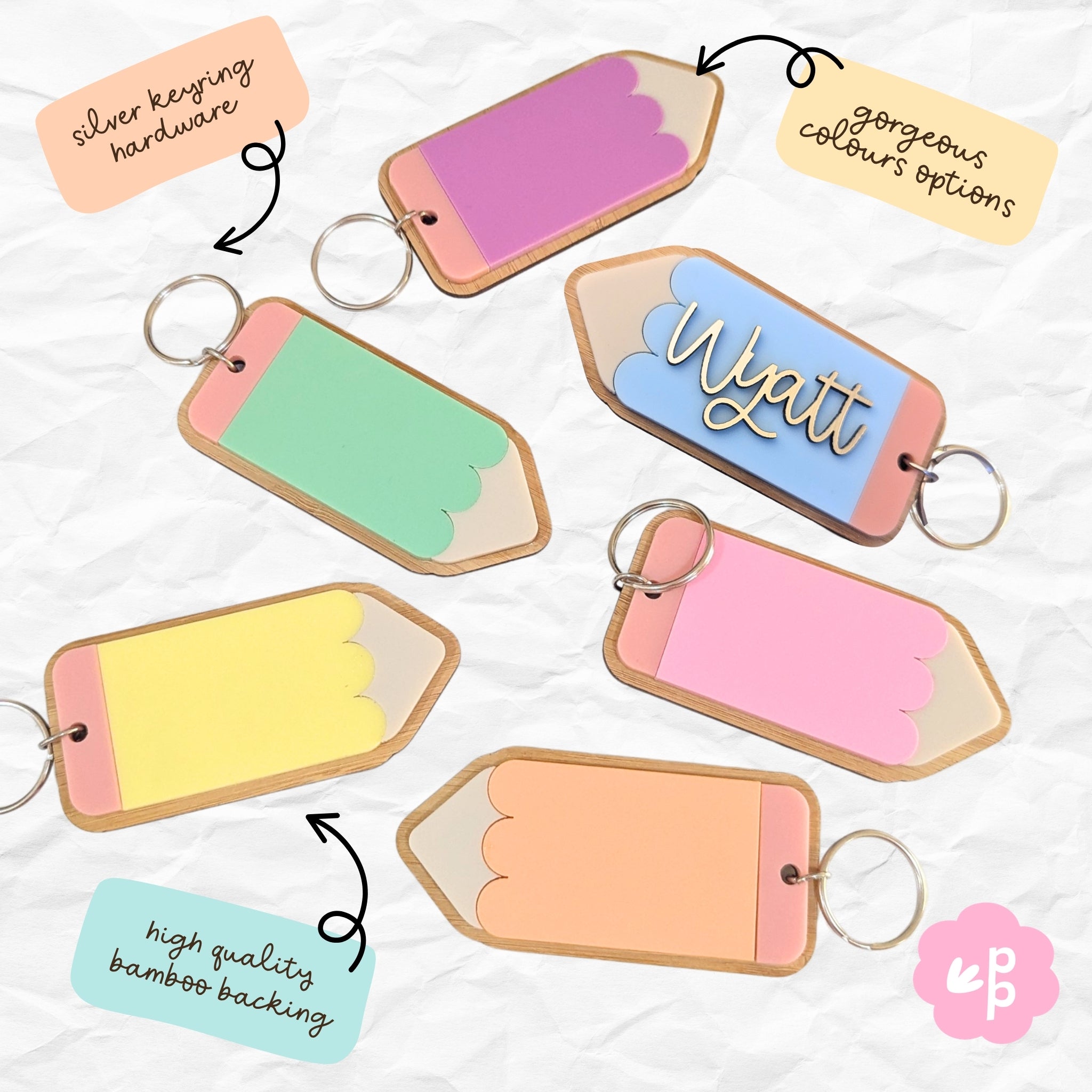 Custom name pencil keyring showing silver keyring hardware, pastel colour options and high quality bamboo backing