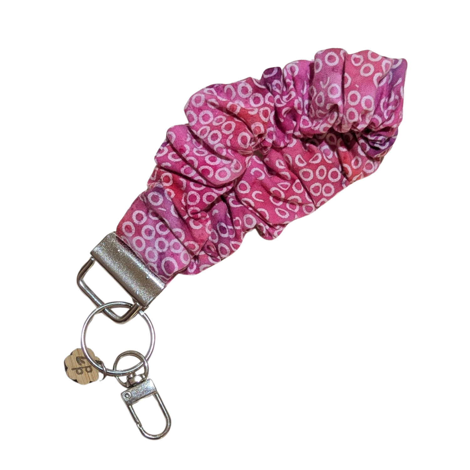 Handmade scrunchie wristlet keychain in pink circle pattern — cute and comfy accessory for everyday use.