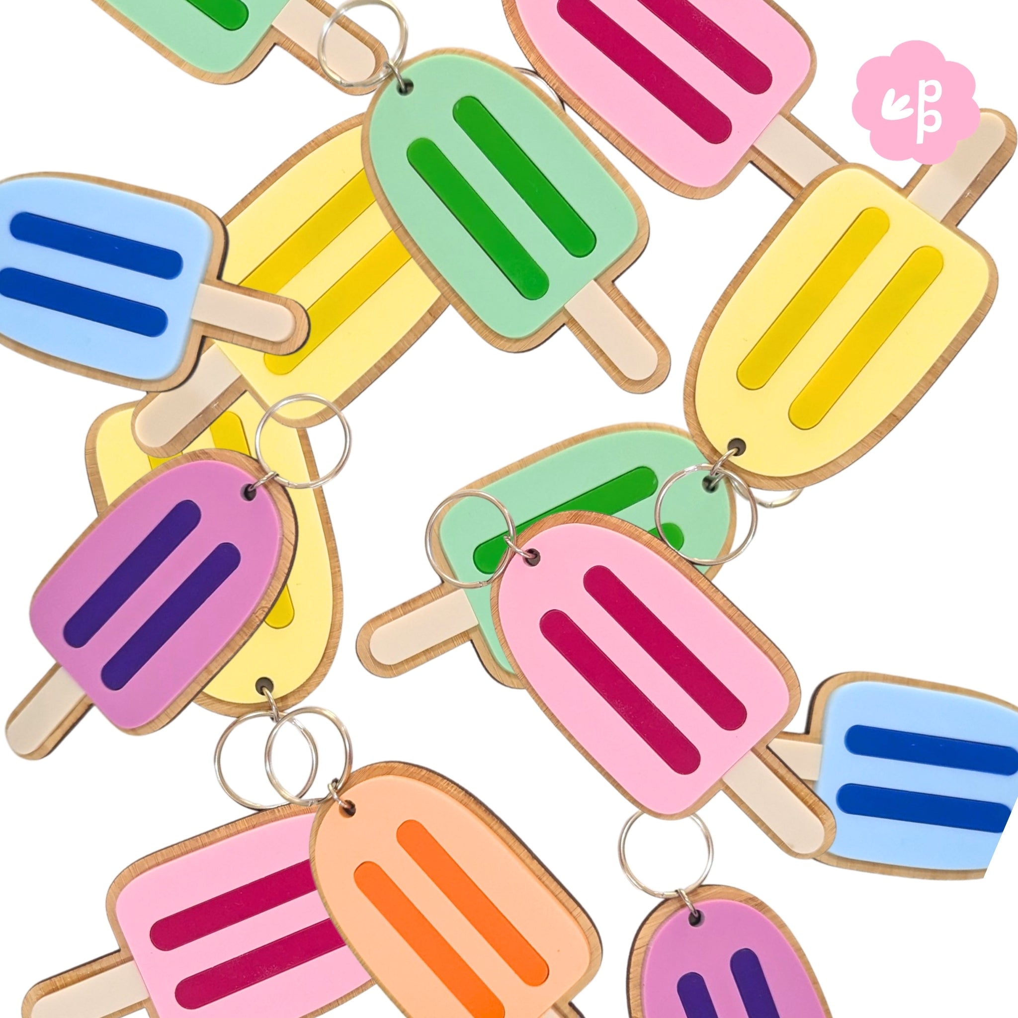 Pastel acrylic popsicle keychains with bamboo backing showing colour options for personalised name keychains