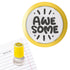 Priority Play “Awesome” teacher stamp with yellow border on school notebook paper.