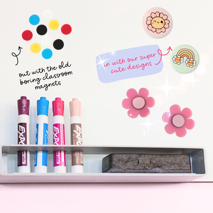 Classroom whiteboard styled with colourful cute magnets replacing standard magnets – teacher desk and whiteboard organisation inspiration.