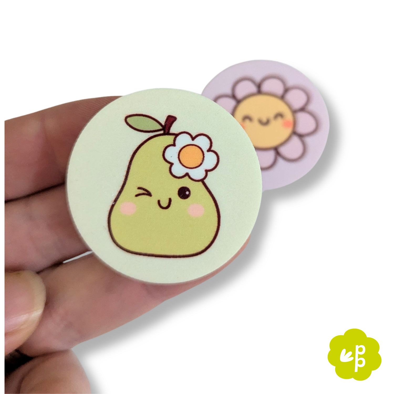 Close-up of a 40mm fruity classroom magnet held in hand featuring a cute pear design – sublimation teacher magnet with smooth finish.