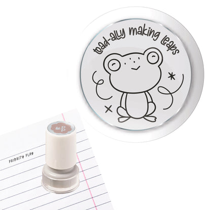 Priority Play ‘Toad-ally Making Leaps’ teacher stamp showing a cute frog with celebratory lines.