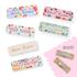 Six unisex teacher name badges with colorful floral and patterned designs displayed with bamboo backings showing magnet and pin attachment options.