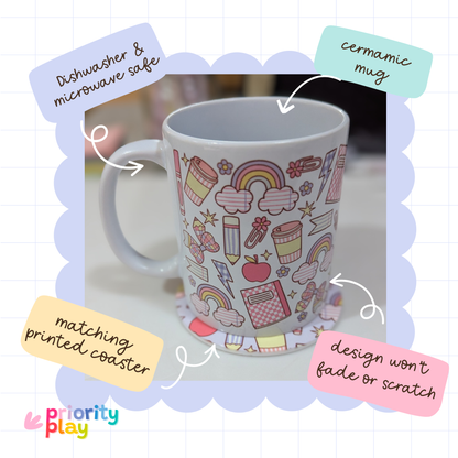 Flatlay of rainbow and cloud themed ceramic mug and coaster set in pastel colours by Priority Play.