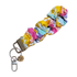Handmade scrunchie wristlet with colorful rainbow flower pattern — cheerful and unique keychain for teachers.
