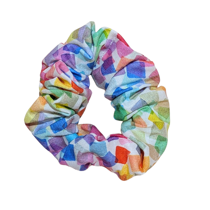 Handmade rainbow geometric scrunchie with colorful confetti pattern