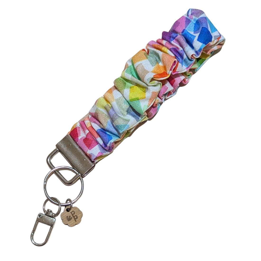 Handmade rainbow geometric scrunchie wristlet keychain — bright and vibrant gift idea for teachers.