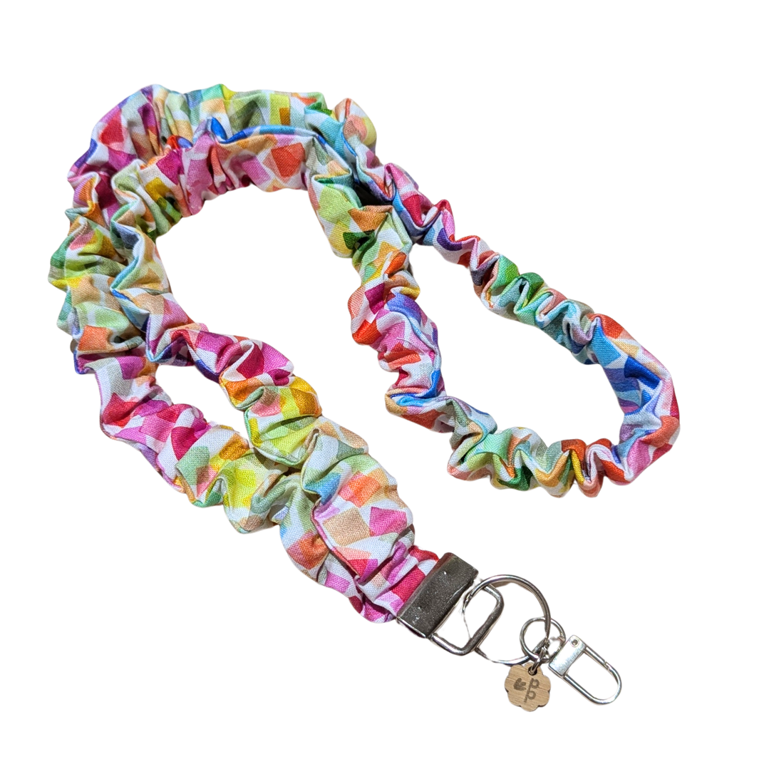 rainbow pattern scrunchie lanyard with keychain on a white background