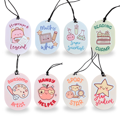 Set of eight colourful school reward lanyards for kids with cute designs and titles like Homework Legend, Maths Whiz, Reading Champ and Star Student by Priority Play
