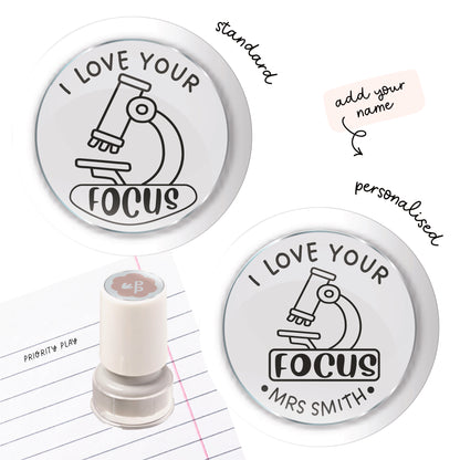 Science teacher stamp featuring a cute microscope and the message ‘I love your focus