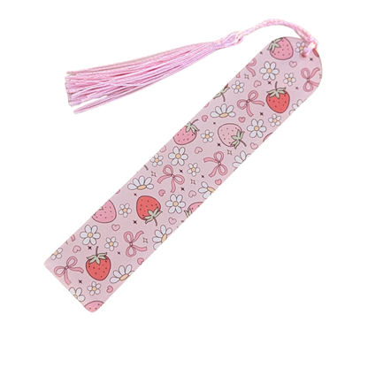 Handmade acrylic bookmark featuring strawberries, daisies, and pink bows with pink tassel.