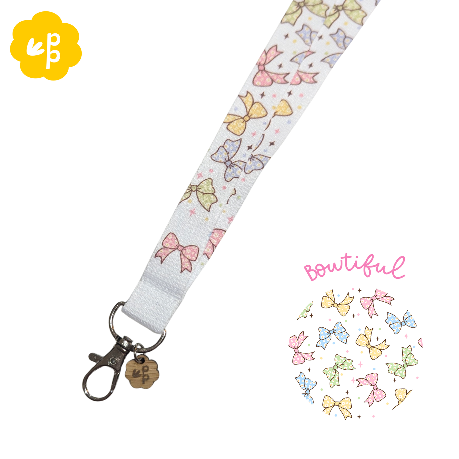teacher Lanyard with colorful bow pattern on a white background and a silver clasp