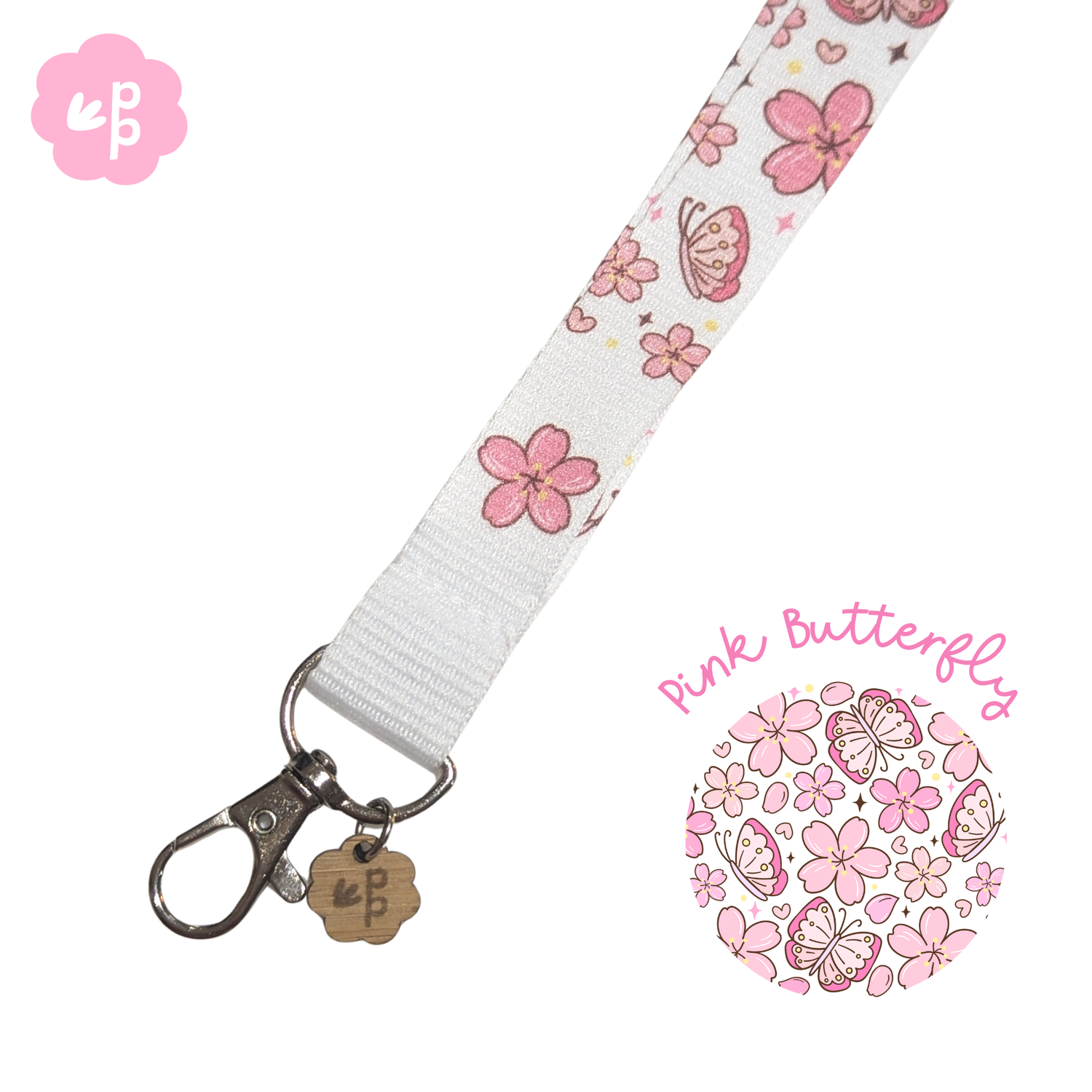White lanyard with pink floral design and &