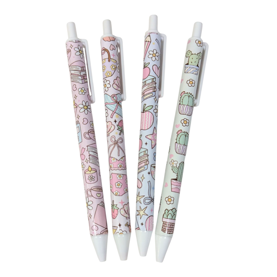 Pastel vinyl wrapped pen set featuring book, cactus, and floral designs, handmade kawaii stationery from Priority Play.