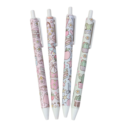 Pastel vinyl wrapped pen set featuring book, cactus, and floral designs, handmade kawaii stationery from Priority Play.