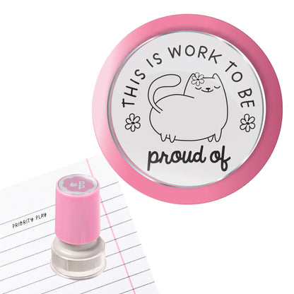 A teacher stamp with a cute fluffy cat and flowers, displaying the phrase “This is work to be proud of