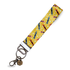 Yellow wristlet keychain with crayon print, handmade and perfect as a colorful teacher gift.